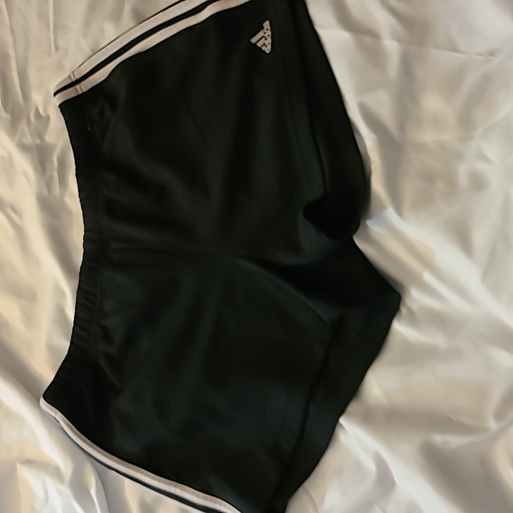 Black with white piping, women's size large, Adidas shorts.